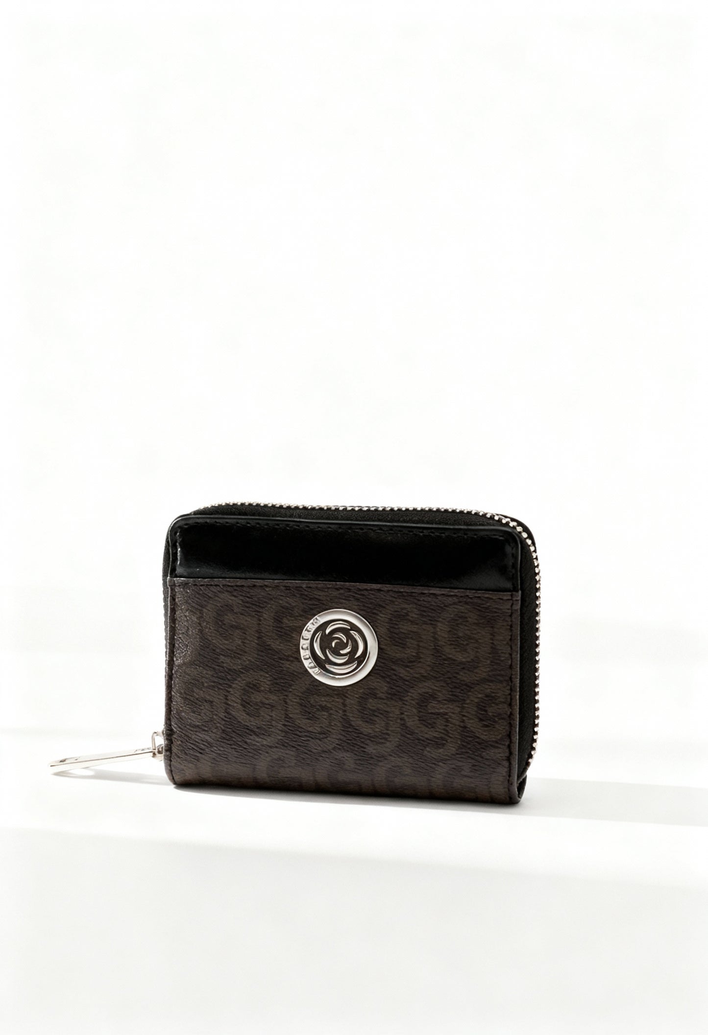 Carrera Jeans AUDREY-CB7273 brown monogram women’s zip wallet with round logo, shown in studio lighting.