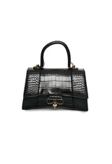 Black mini croco handbag with gold accents and top handle, Egon Von Furstenberg.