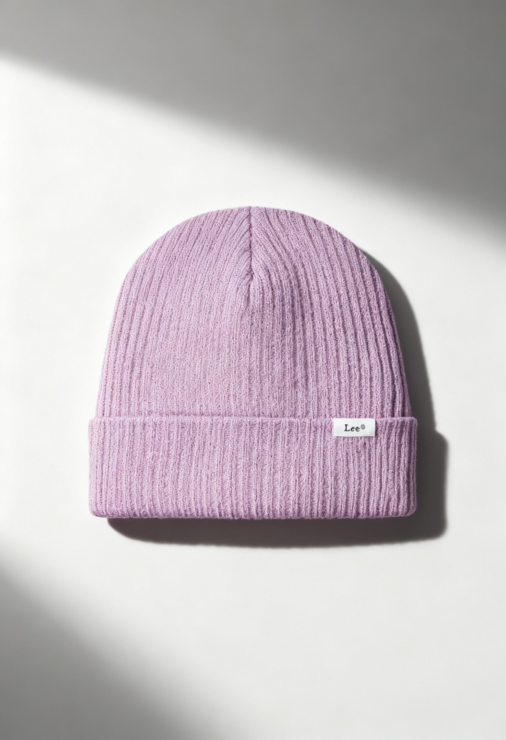 Lee 112358334 lilac ribbed knit women’s beanie hat with folded cuff and Lee logo, lit in bright studio light.