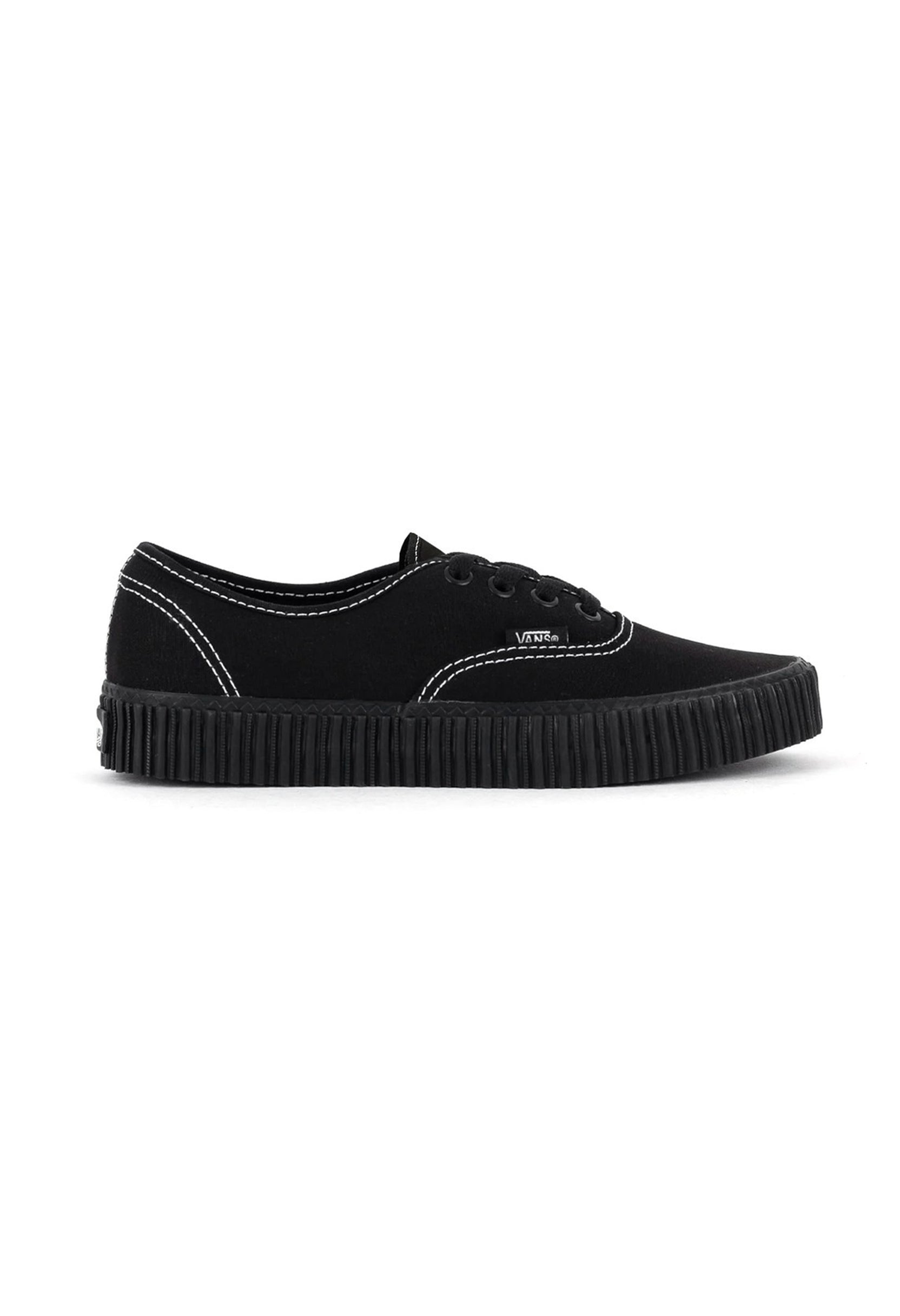 Side view of Vans VN000CR2BLK1 black canvas sneakers featuring round toe and rubber sole.