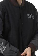 Close-up of Vans VN000JY1KOU1 bomber jacket showing embroidered Vans chest logo and grey sleeve contrast.