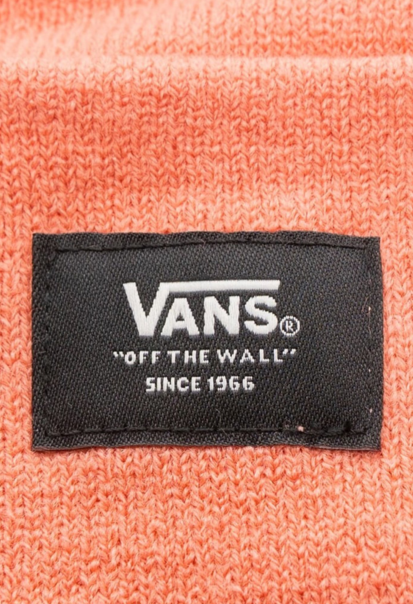 Close-up of Vans VN0A5GPLQID1 orange beanie hat showing woven Vans patch and textured knit.