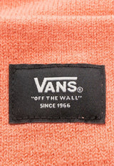 Close-up of Vans VN0A5GPLQID1 orange beanie hat showing woven Vans patch and textured knit.