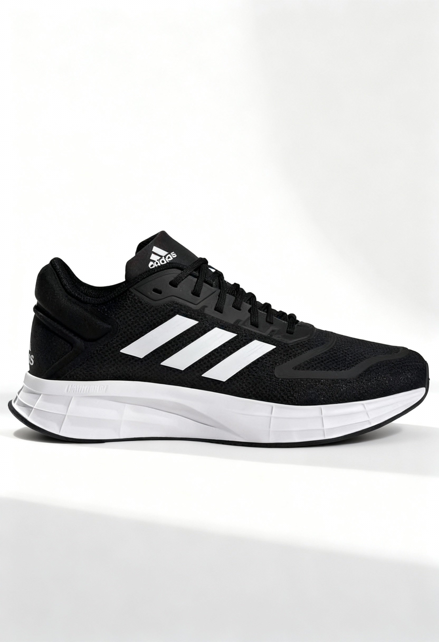 Brand new Adidas Duramo 10 men's running shoes in core black with white stripes side view.