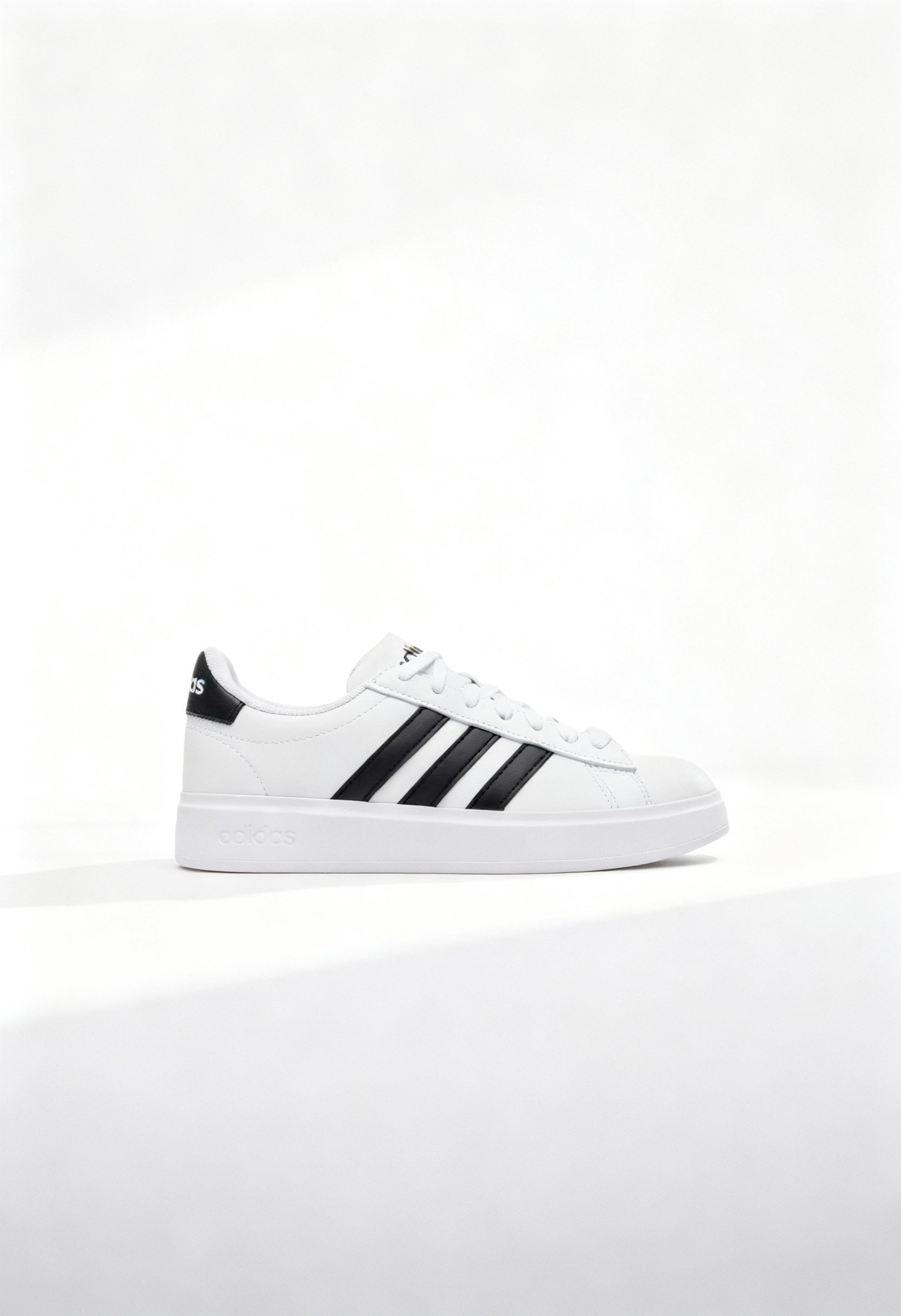 Brand new Adidas Grand Court 2.0 men's sneakers in core white with black 3-stripes side view.