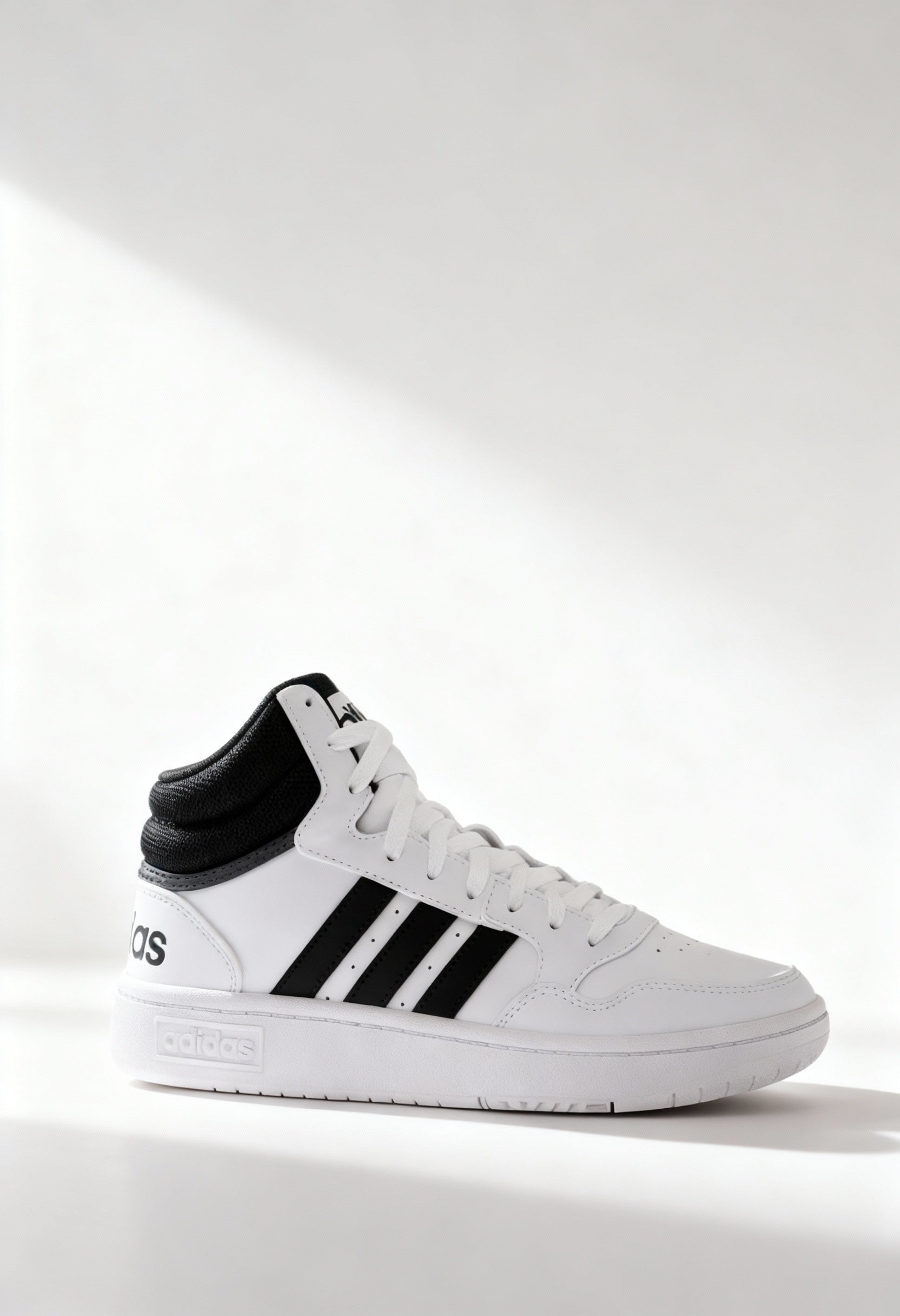 Brand new Adidas Hoops 3.0 Mid men's sneakers in core white with black stripes side view.