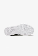 White rubber cupsole and flat tread pattern of the Adidas Hoops 3.0 Mid sneakers for grip.