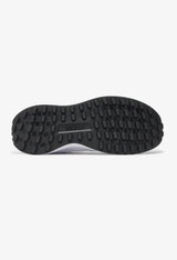 Durable rubber outsole and tread pattern of the Adidas RUN 70S sneakers for reliable grip.