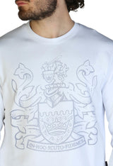 Aquascutum logo crest jumper, close-up detail of the graphic on the white version.
