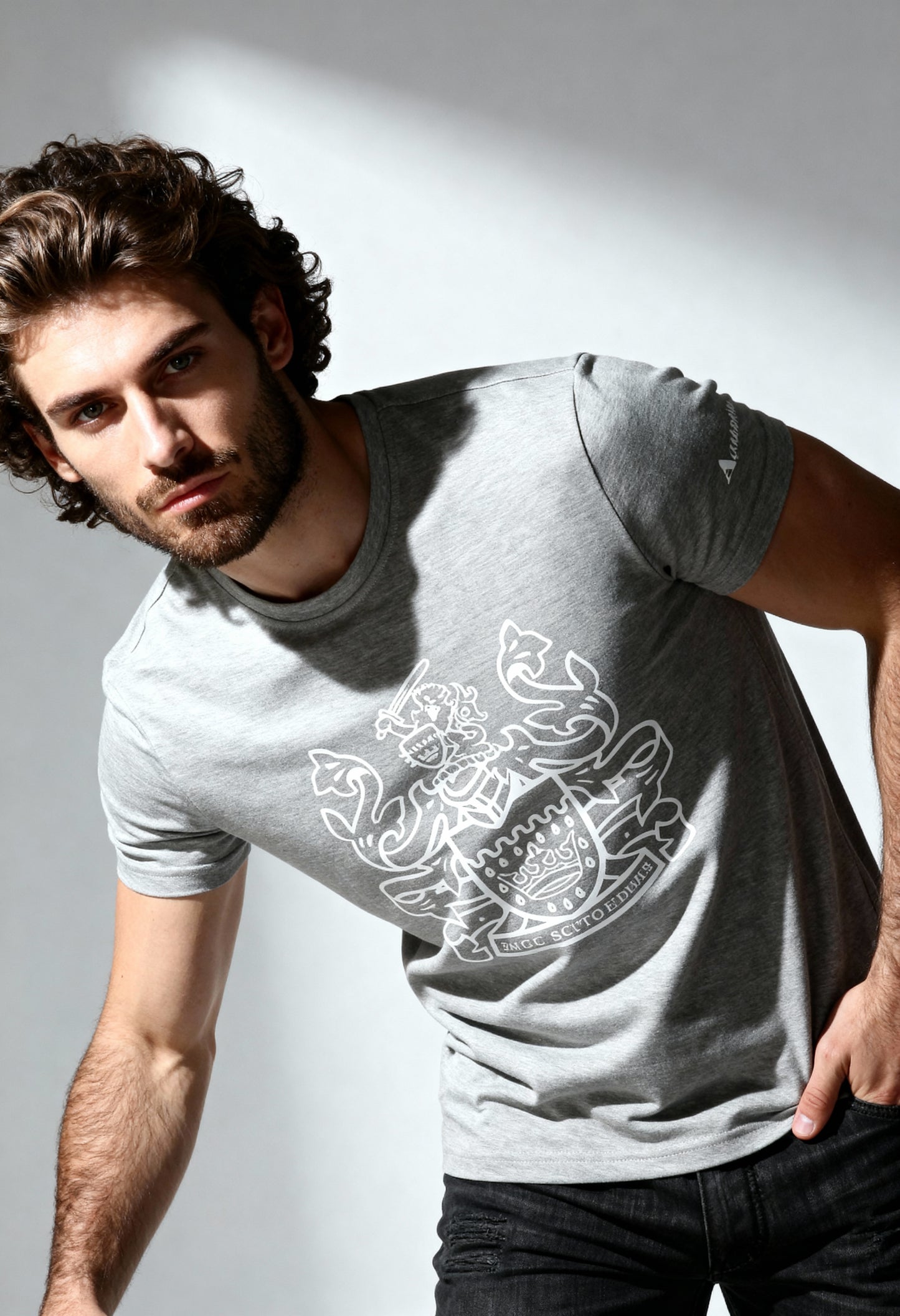 Aquascutum QMT002M0 men's stretch cotton T-shirt in dark color, worn by model.