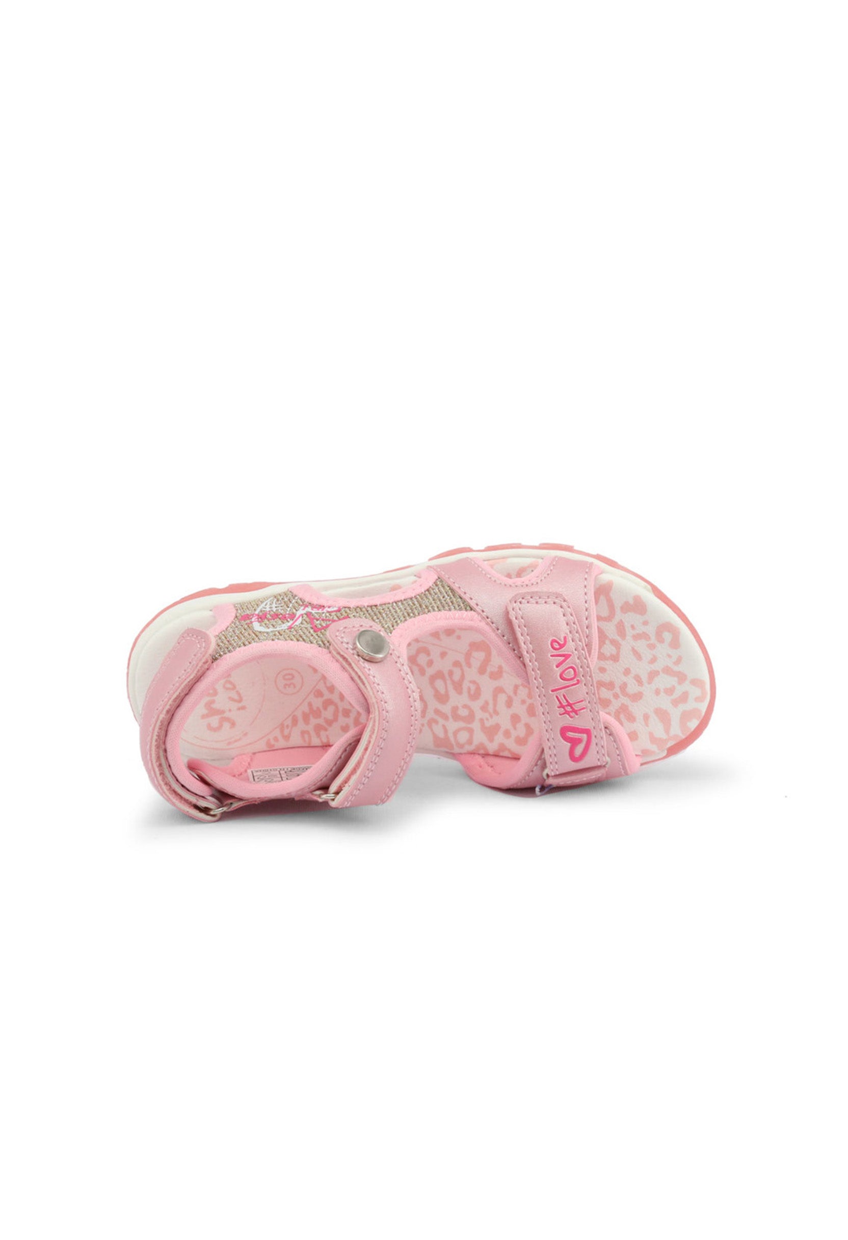 Children's pink light-up sandals, folded view showing fabric lining.