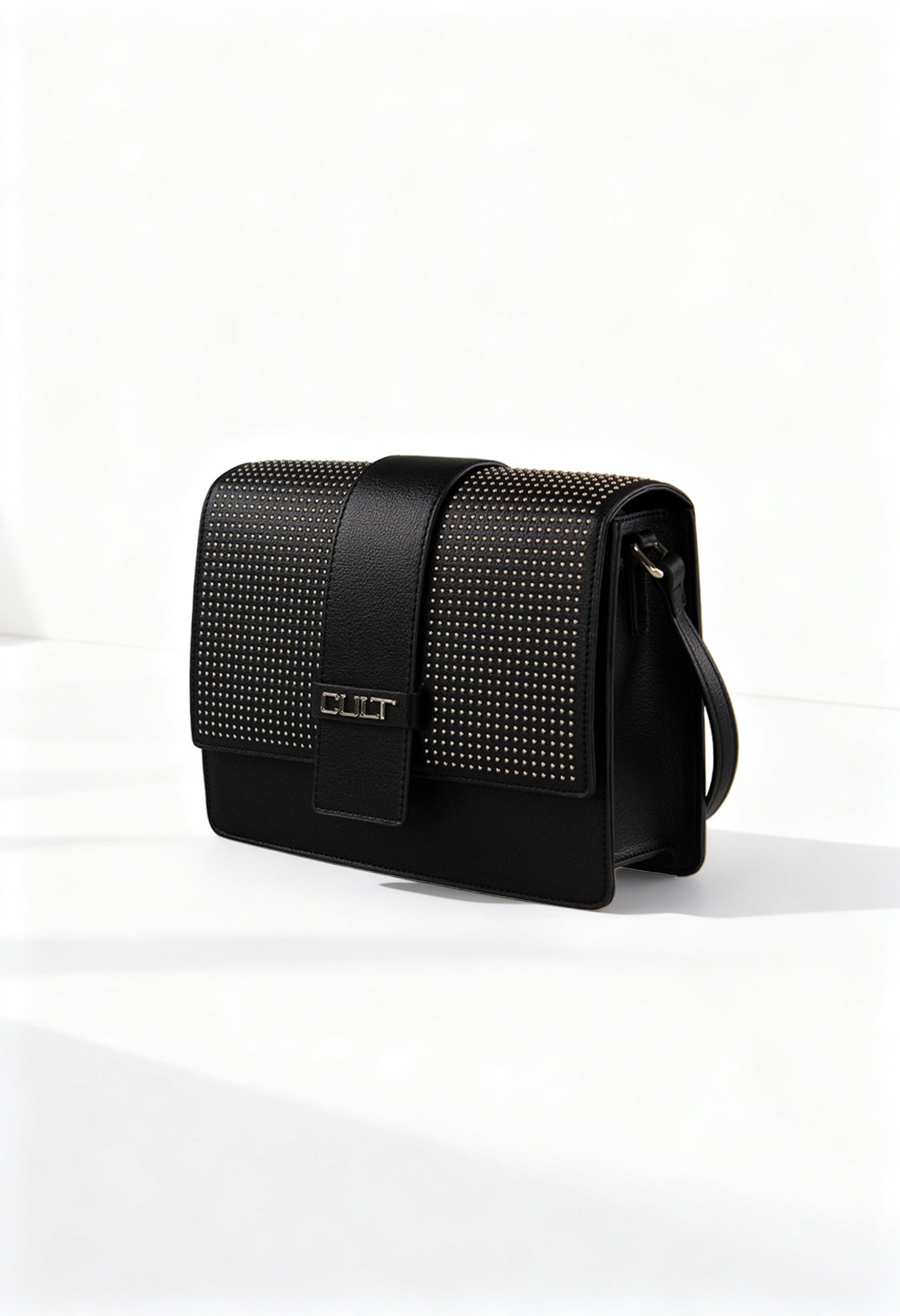 Front view of the black Cult shoulder bag featuring studded detailing and structured shape.