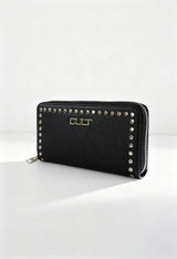 Front angled view of the black Cult woman wallet with metallic studs on a light background.