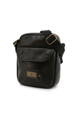 Durable polyurethane across-body bag for man, side view showing front flap pocket and brass hardware.