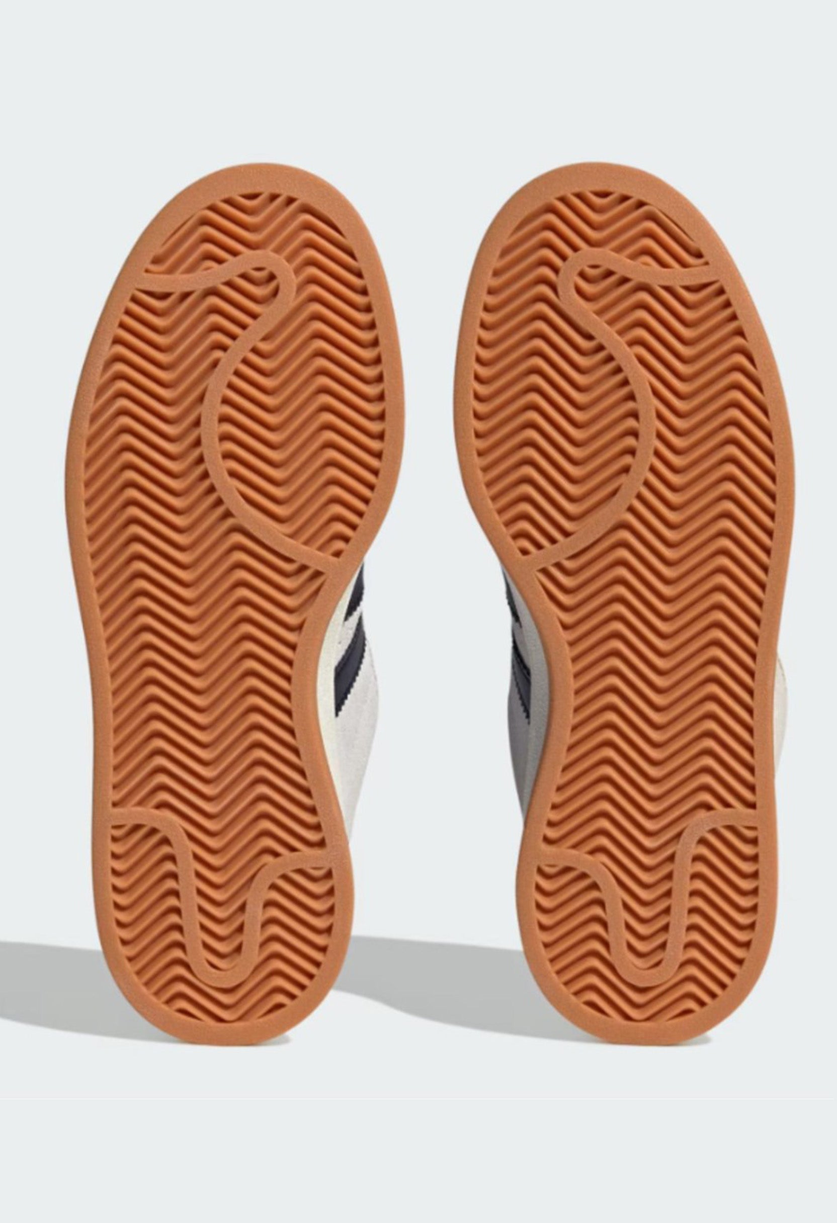 View of the durable rubber sole and tread pattern on the Adidas Campus sneaker.
