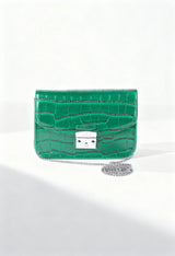 Front display of the green Egon Von Furstenberg Valery crossbody bag with metallic clasp.