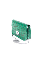 Side angle of the green Valery crossbody bag showing its structured shape and crocodile texture.