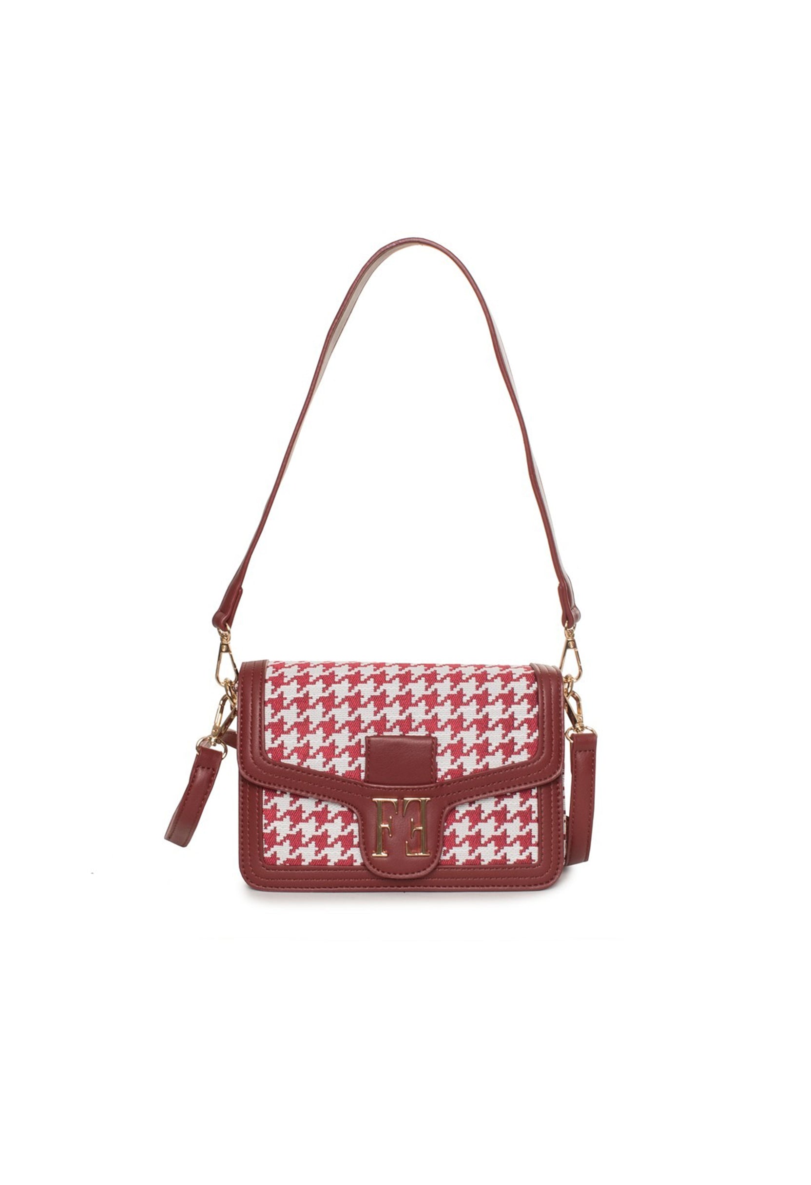 Studio front shot of the burgundy Alison handbag showing the woven pattern and top handle.