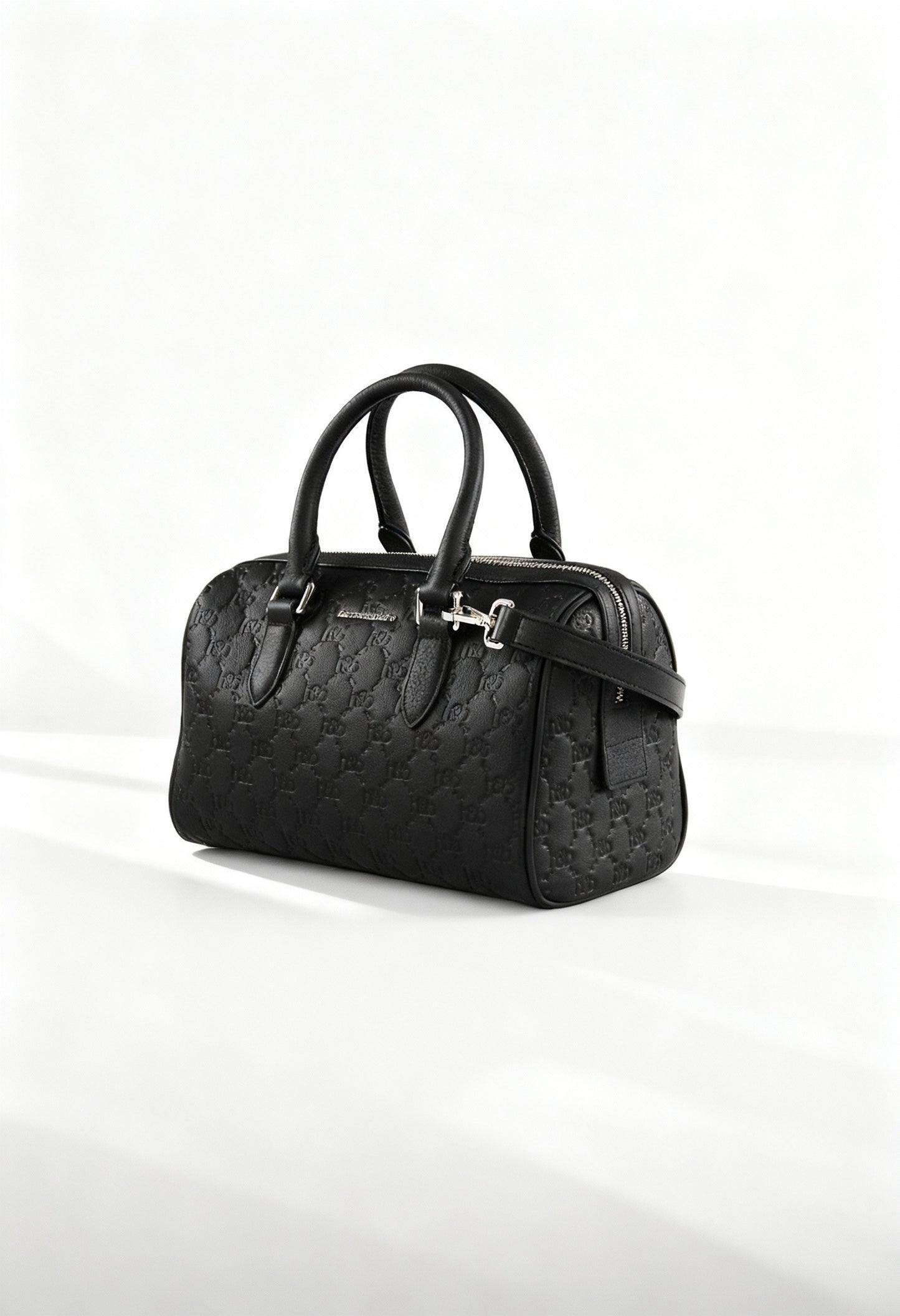 Front angled studio shot of the Harmont&Blaine H4DPWH480022 black embossed shoulder bag with dual handles and removable strap.