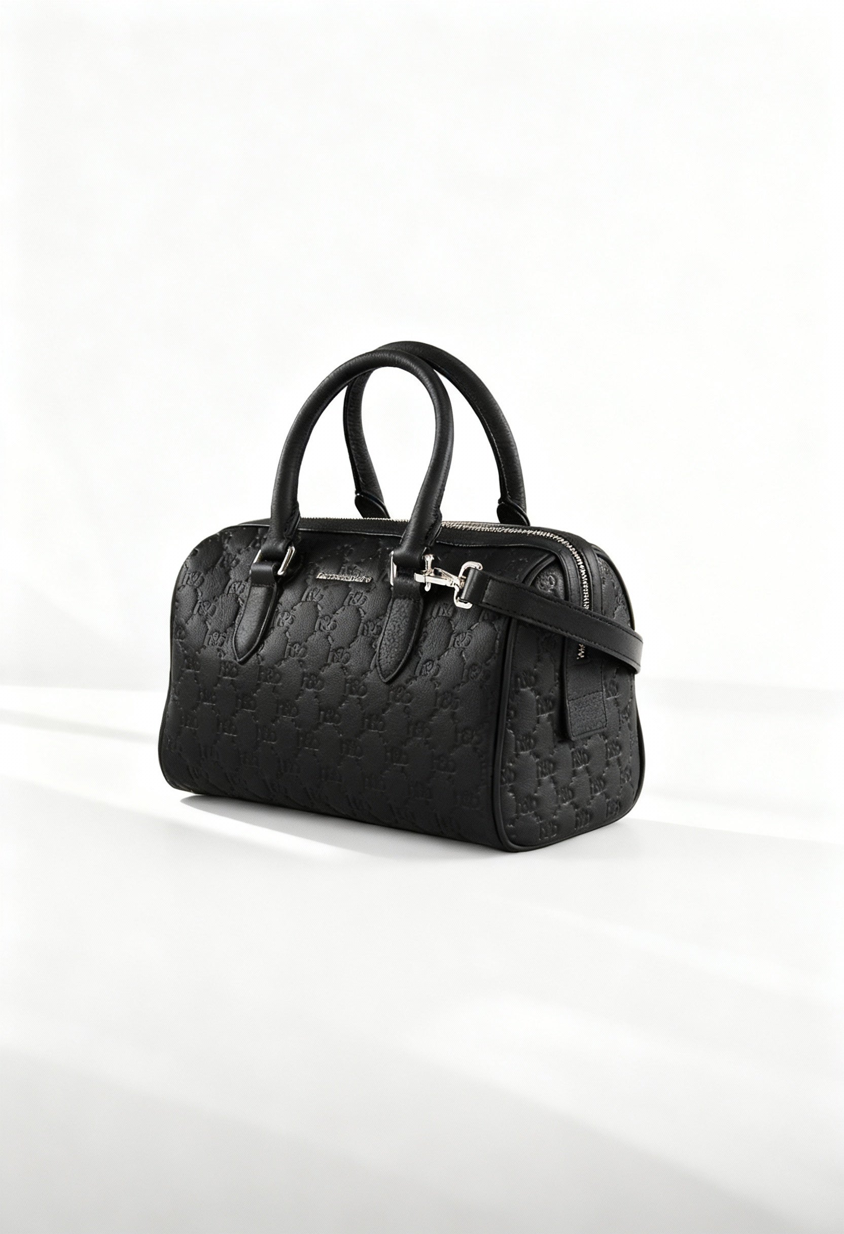 Front angled studio shot of the Harmont&Blaine H4DPWH480022 black embossed shoulder bag with dual handles and removable strap.