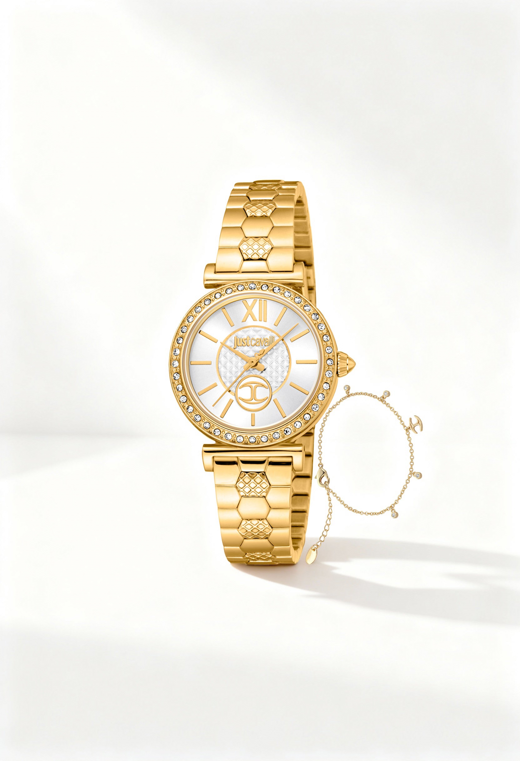 Front angled view of the Just Cavalli JC1L273M0055 woman watch featuring a gold textured bracelet and white dial with crystal bezel.