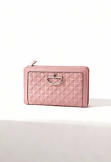 Front angled view of the dusty pink Lamarthe ST201 leather wallet with textured pattern on a light background.