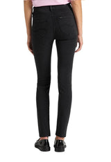 Back view of a woman wearing black Lee L626SHMY skinny jeans showing pockets and fit.