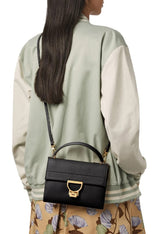 Luxury black leather mini handbag styled as a crossbody bag for women from France AJ Luxe.