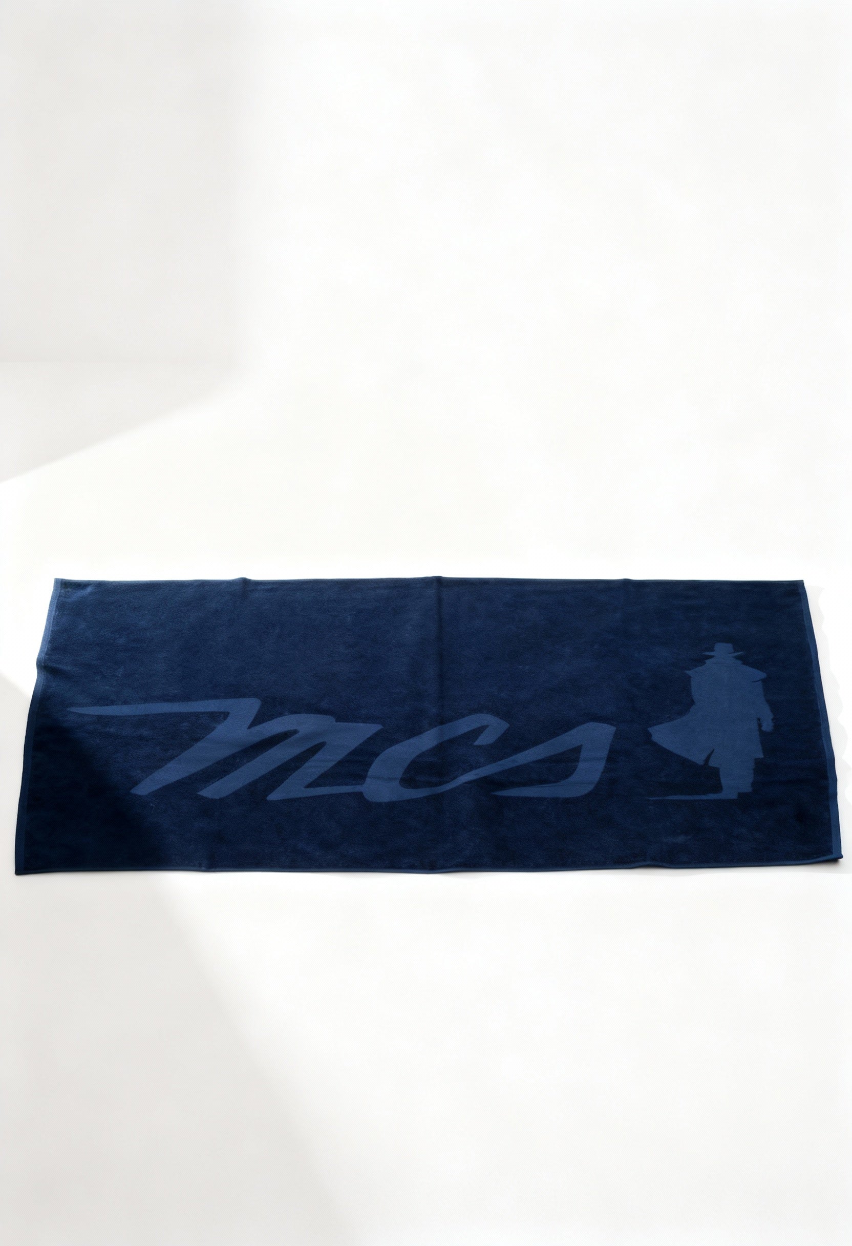 MCS 10BTL002 large cotton logo towel in navy blue, laid flat, visible logo.