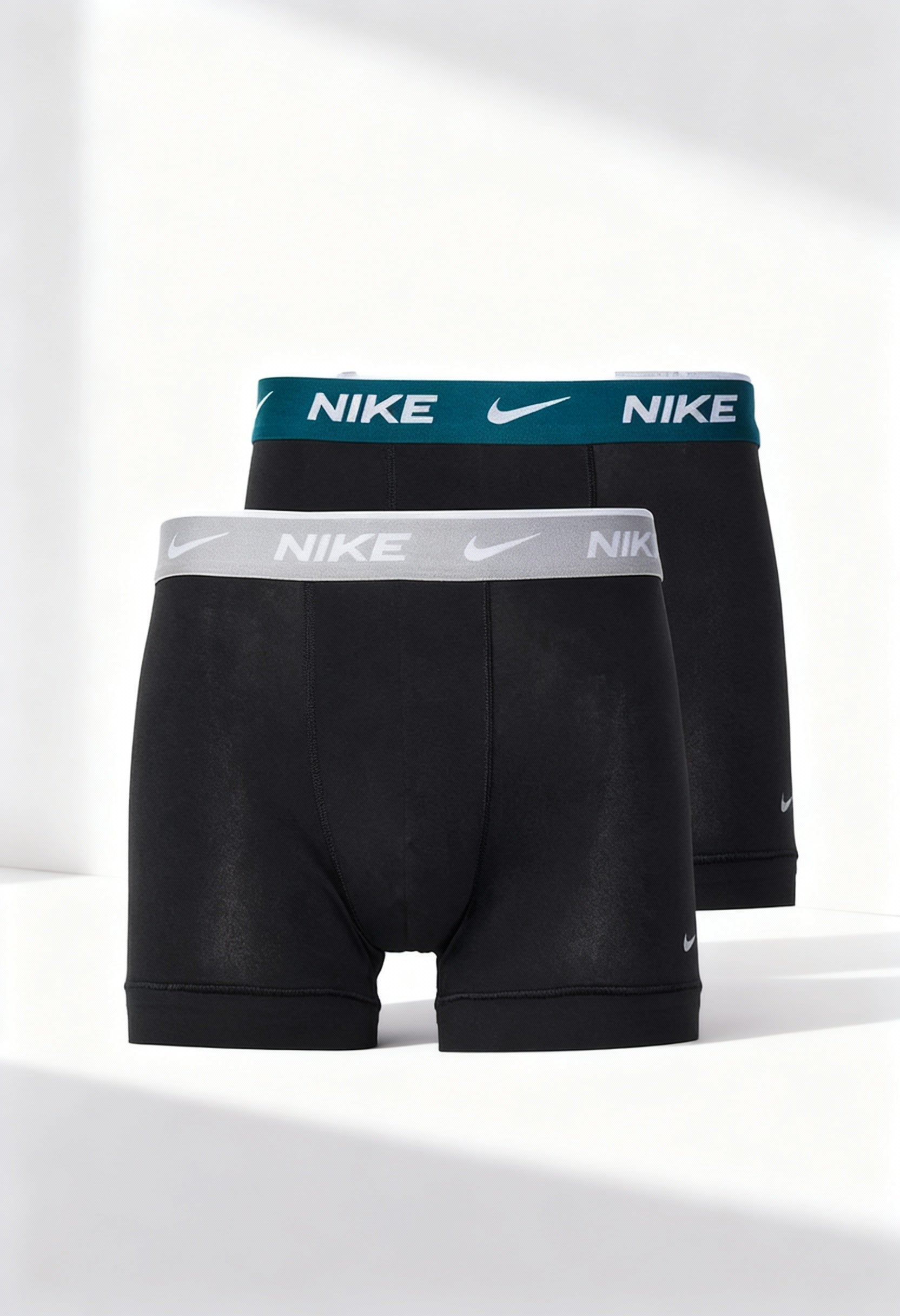 Nike 0000KE1085 men's boxer shorts 2-pack, showing teal and grey waistband variants.