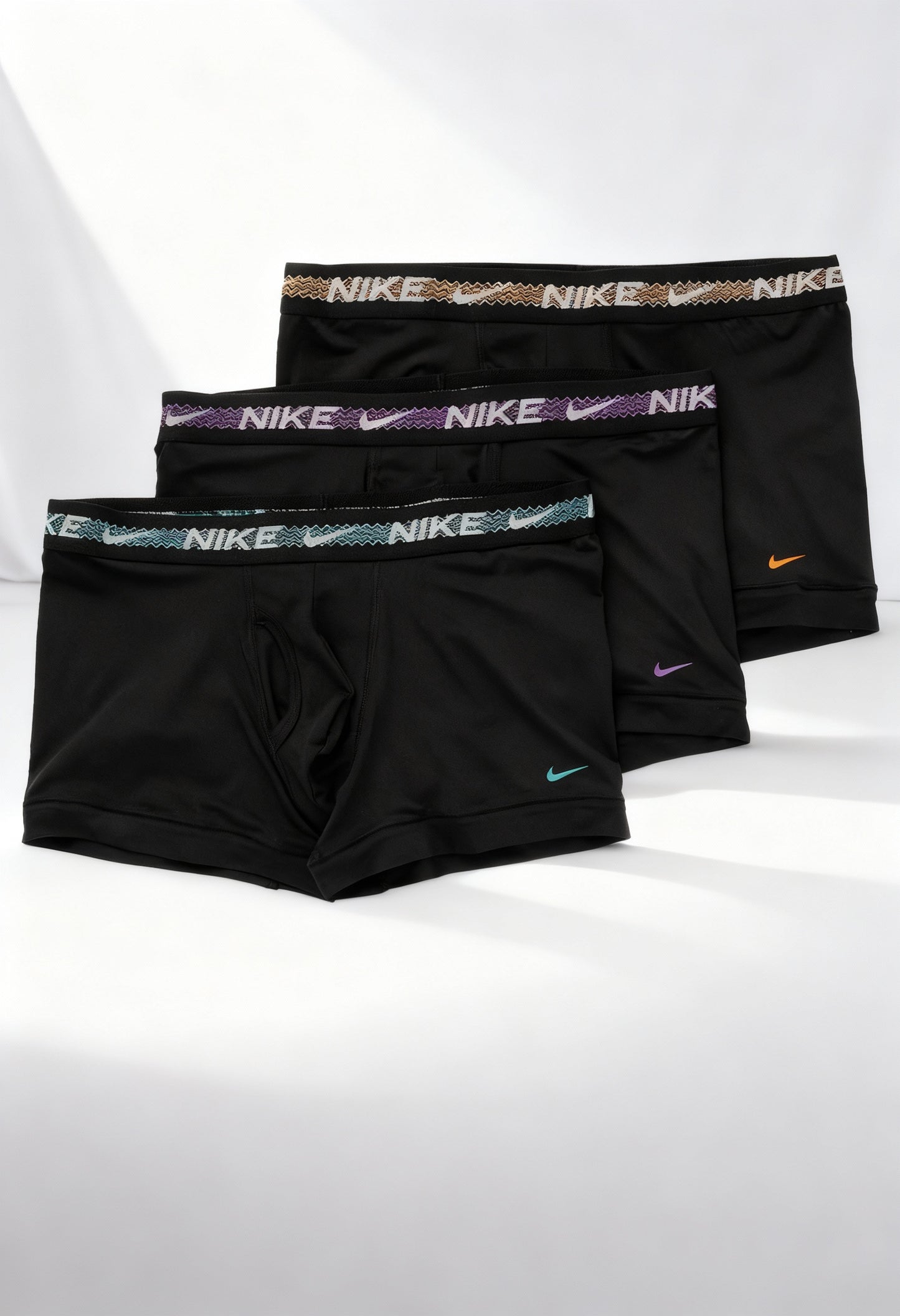 Nike 0000KE1152 men's boxer shorts 3-pack, showing colorful printed waistbands (teal, purple, green).