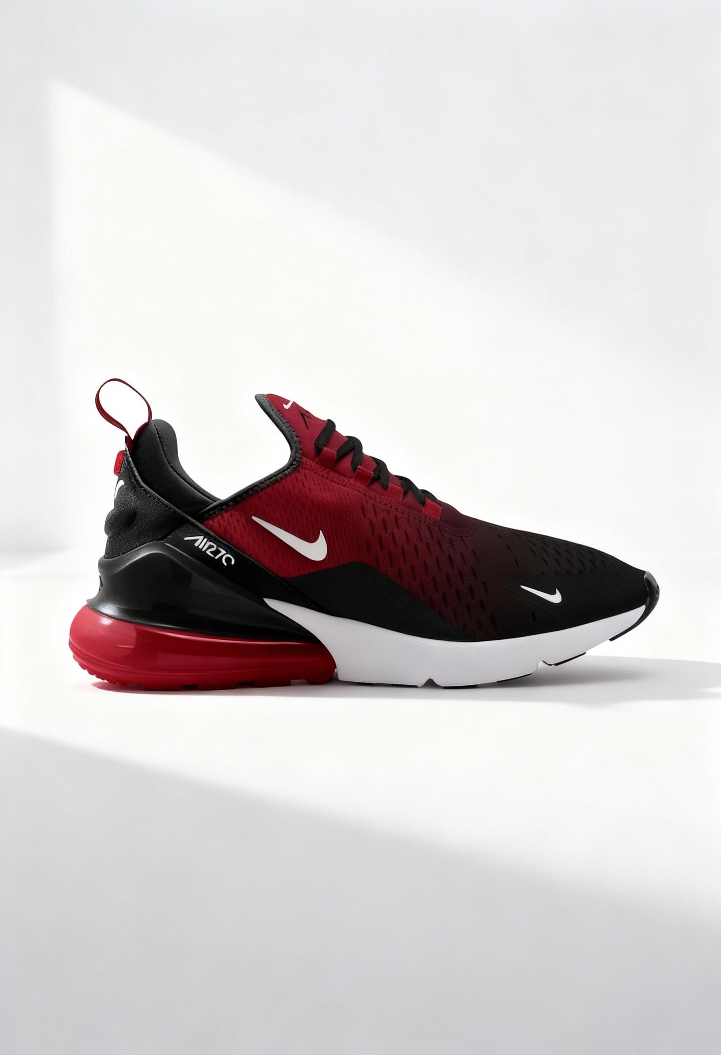 Brand new Nike Air Max 270 men's sneakers in red and black side view.