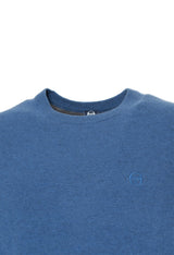 Sergio Tacchini wool jumper in blue, close-up of knit texture.