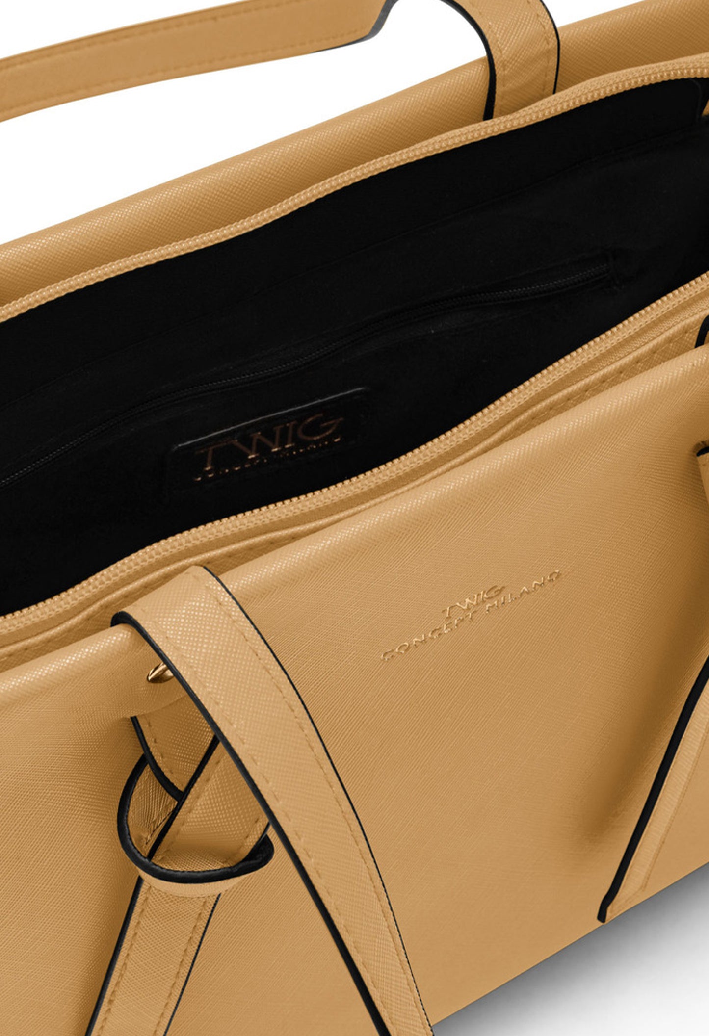 Close-up view of the beige Twig Debussy bag showing stitching, handle detail, and logo.