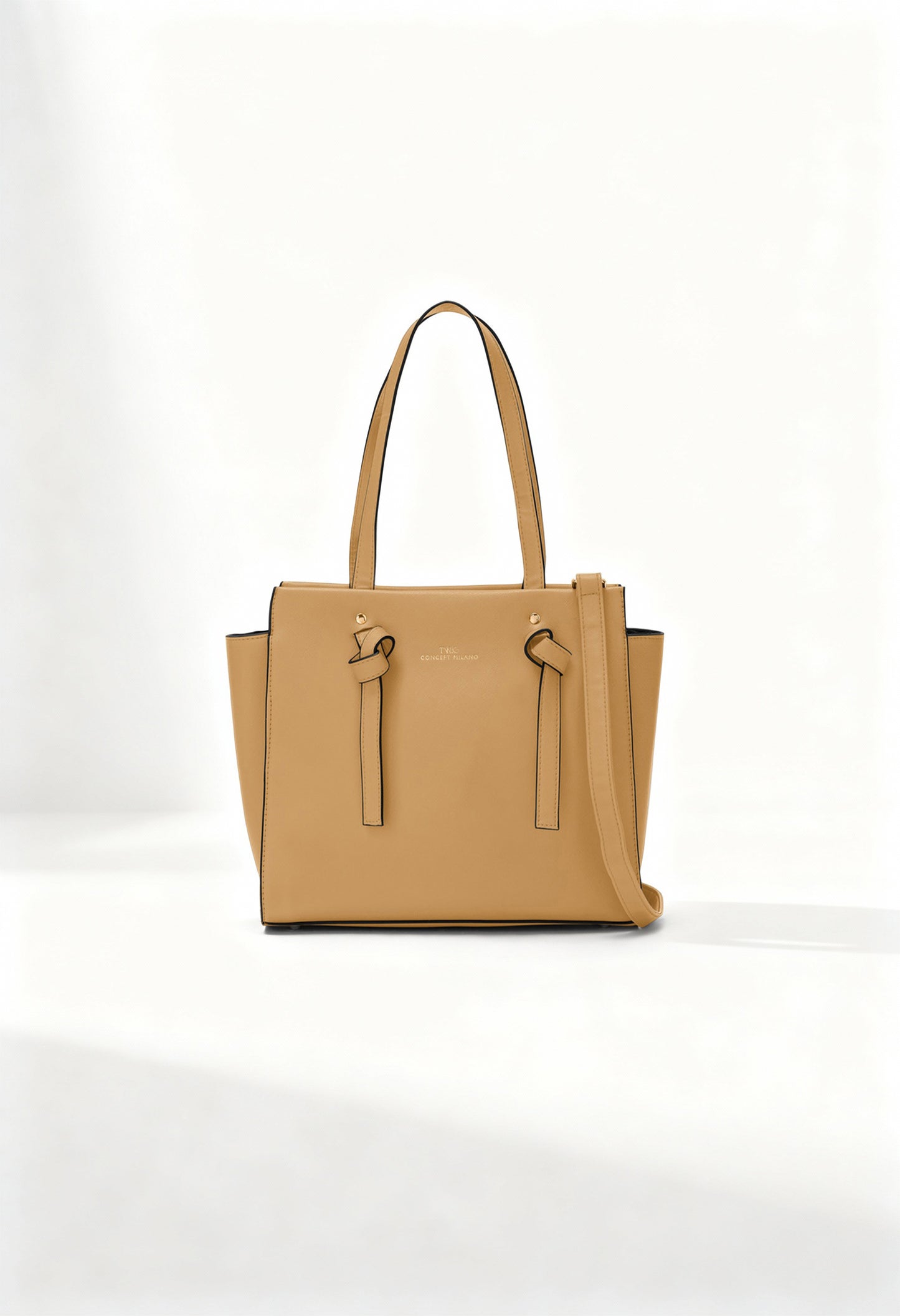 Front angle of the beige Twig Debussy shoulder bag with structured silhouette and knot detailing.