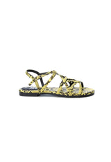 Side view of the yellow Xti 49578 sandals showing the multi-strap upper and flat sole.